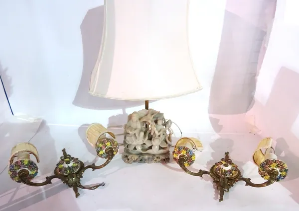 Lighting, comprising; a Chinese carved softstone lamp base and a pair of porcelain mounted wall lights, (3).  S3B
