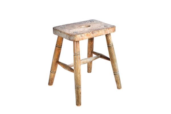 "W Birch Wycombe 1914"; a 19th century elm and beech stool, with pierced rectangular seat on turned supports, stamped to underside, 42cm wide x 47cm h