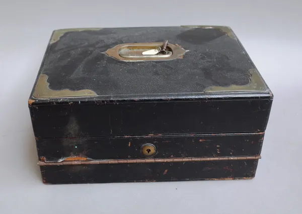 A Victorian brass bound leather writing slope, with fitted interior and Bramah lock, 31cm wide x 15cm high x 24cm deep.