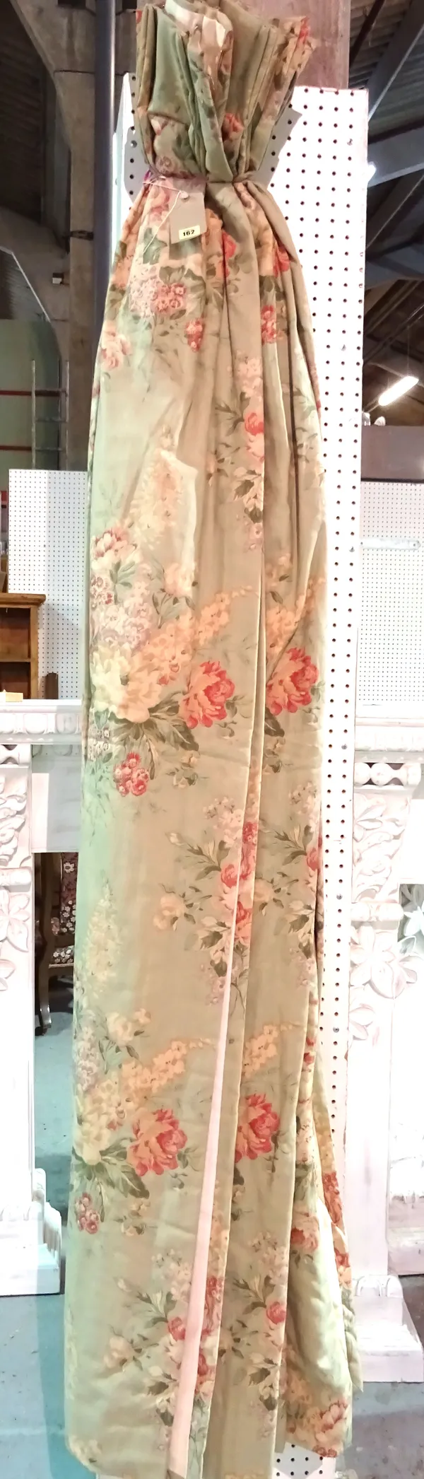 Curtains, comprising; a pair of Ralph Lauren grey and floral lined and interlined curtains, 120cm wide x 190cm fall, (2).   HANG