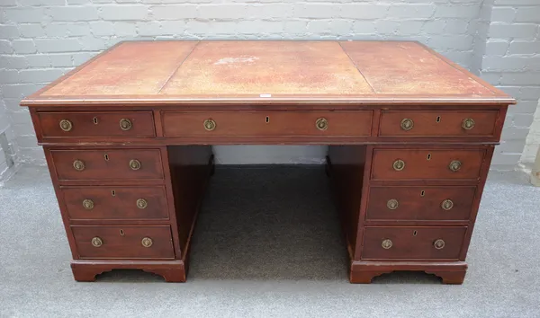 A mid-18th century style mahogany partner's desk, with nine drawers about the knee and opposing pedestal cupboards, on bracket feet, 150cm wide x 73cm