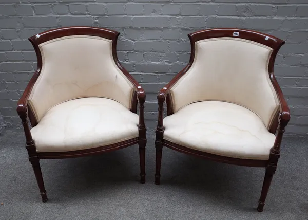 A pair of mahogany framed tub back open armchairs, on turned supports, 61cm wide x 85cm high (2).