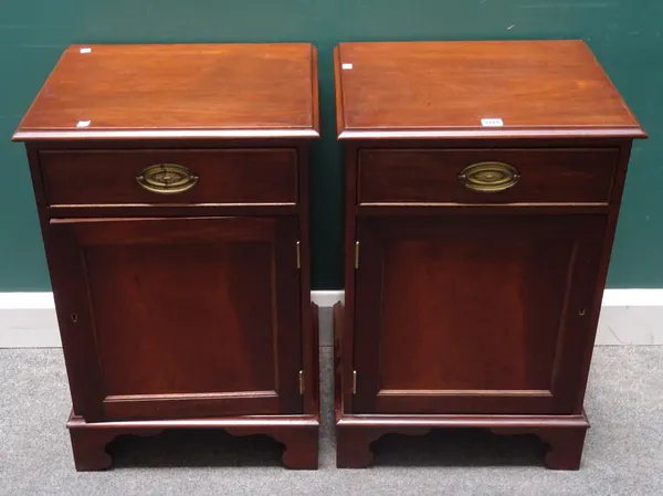 A pair of George III style mahogany bedside tables, each with single drawer over cupboard, on bracket feet, 49cm wide x 74cm high x 39cm deep (2).