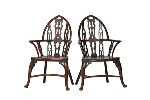 A pair of Strawberry Hill Gothic Revival ash and elm open arm Windsor chairs, with solid seat and crinoline stretcher, 61cm wide x 108cm high (2). Ill