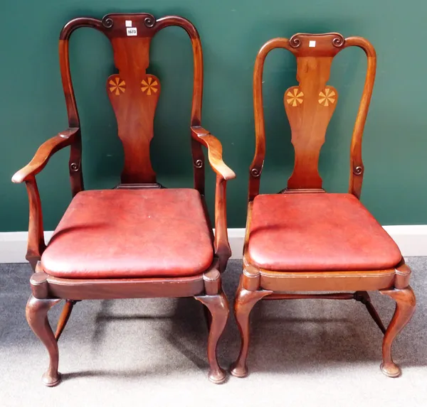 A set of six 19th century inlaid mahogany dining chairs, of Queen Anne design, each with vase back, on cabriole supports united by block and turned st