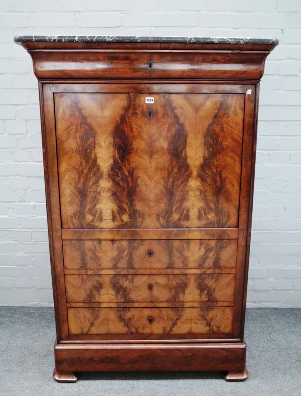 An early 19th century French secretaire a abattant, the marble top over a mahogany base with single drawer and fall front over four further drawers, 9