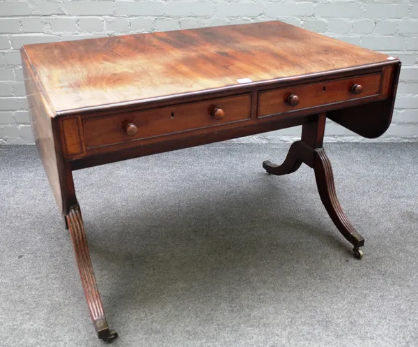 A George III mahogany sofa table with pair of frieze drawers and dummy opposing on four downswept supports, 99cm across x 154cm across open x 71cm hig