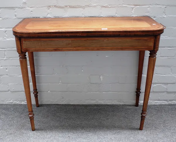A late George III partridgewood inlaid rosewood card table, with rounded rectangular top on turned supports, 92cm wide x 74cm high x 42cm deep.