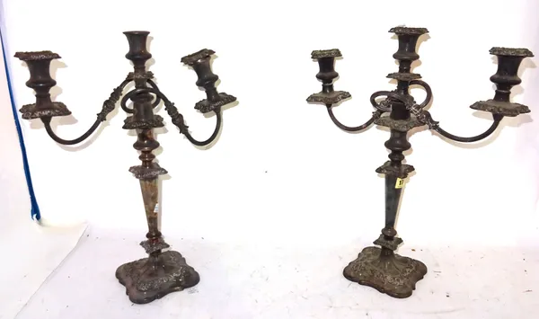A pair of silver plated three light table candelabra, 47cm tall (2).  I6