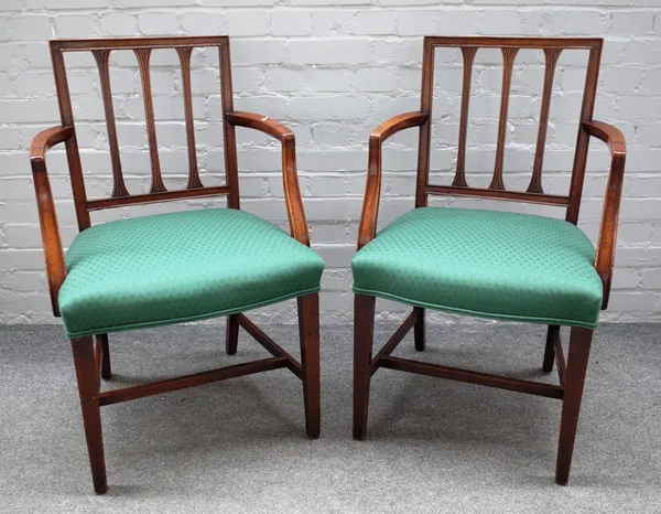 A pair of George III mahogany carver chairs, with bow seats on tapering square supports, 54cm wide x 92cm wide (2).