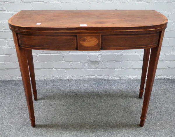 A George III inlaid mahogany 'D' shaped tea table, on tapering square supports, 92cm wide x 45cm deep x 72cm high.