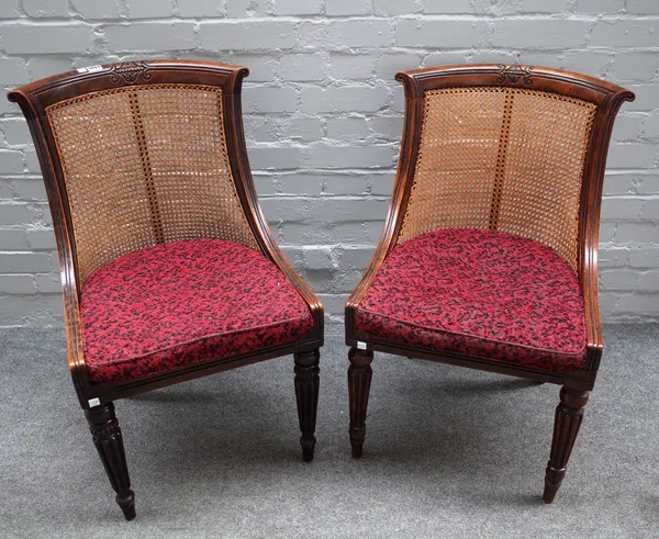 A pair of William IV stained beech tub back side chairs on tapering reeded supports, 49cm wide x 81cm high (2).