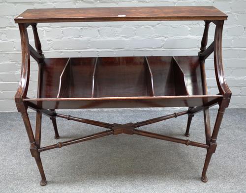 A George III style mahogany free standing book trough, on turned supports, united by 'X' frame stretcher, 92cm wide x 84cm high x 40cm deep.