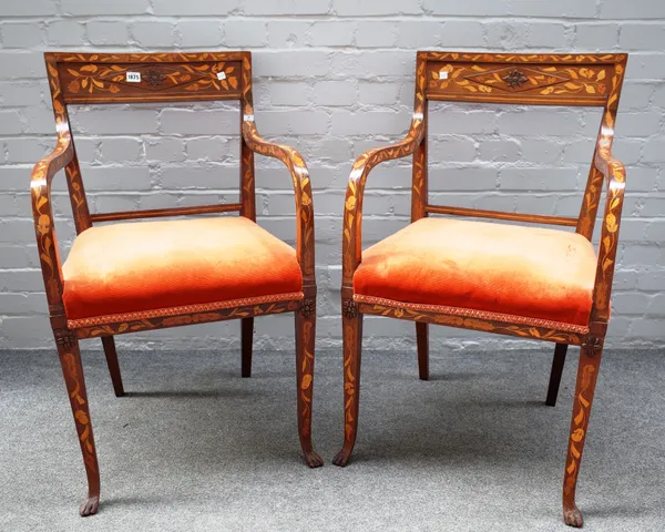 A pair of 19th century Dutch floral marquetry inlaid mahogany open armchairs, on tapering supports and paw feet, 52cm wide x 90cm high (2).