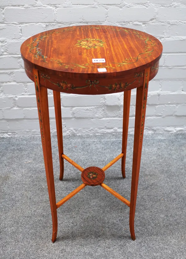 An Edwardian circular satinwood occasional table with painted floral decoration on splayed supports, 41cm diameter x 73cm high.