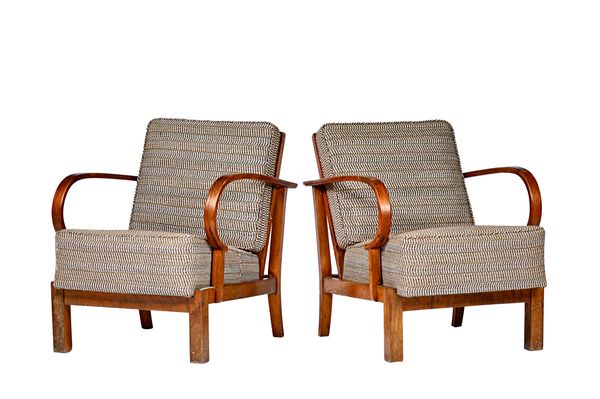 Kleinert; a pair of mid-20th century walnut framed reclining easy open armchairs on block supports, 64cm wide x 76cm high (2). Illustrated