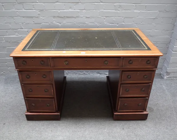 A Victorian mahogany pedestal desk, with nine drawers about the knee, on plinth base, 122cm wide x 70cm deep x 75cm high.