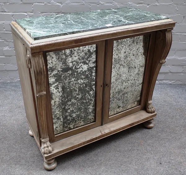 A 19th century and later painted marble top side cabinet, the pair of veneered doors flanked by scroll columns, capped with paw feet, 82cm wide x 78cm