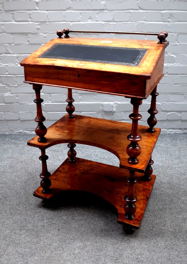 A Victorian marquetry inlaid walnut bureau, the slope top over two concave open tiers, 56cm wide x 89cm high x 40cm deep.