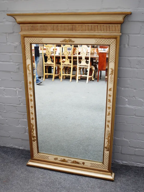 A cream lacquer parcel gilt decorated rectangular mirror, with fluted frieze and bevelled rectangular mirror plate, 85cm wide x 128cm high.