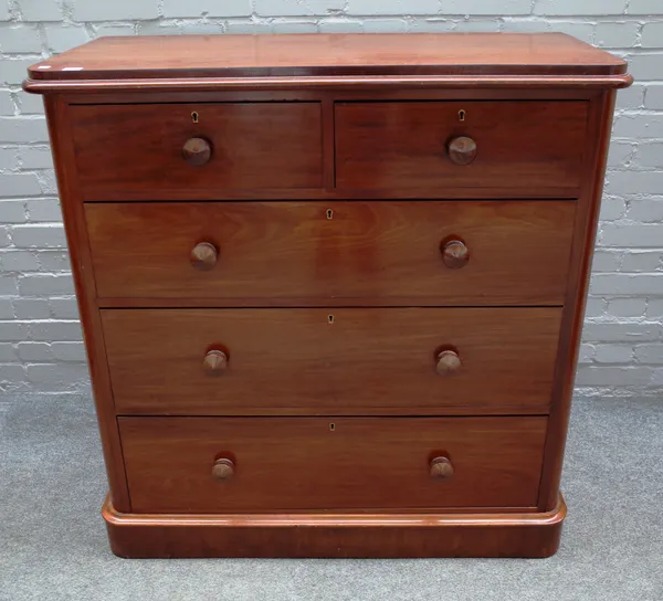 A Victorian mahogany chest of two short and three long graduated drawers, on plinth base, 109cm wide x 112cm high x 52cm deep.