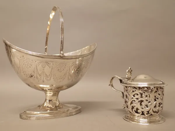 Silver, comprising; a George III oval basket, of navette shaped form, with a swingover handle and with engraved decoration, London 1794 and a mustard