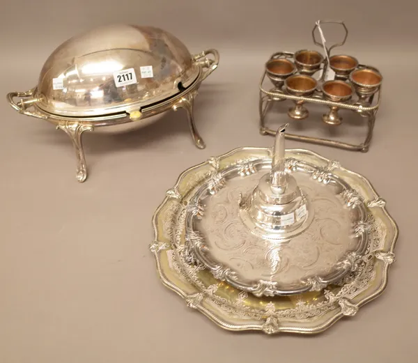 Plated wares, comprising; a twin handled oval lidded breakfast dish, raised on four feet, with a plain oval and a pierced oval drop-in liner, a shaped