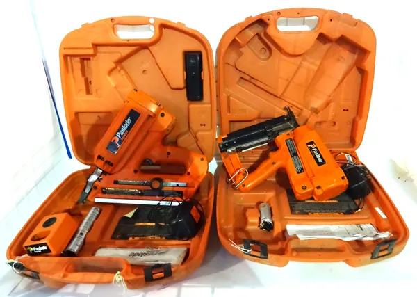 A pair of PASLODE nail guns, cased.  S4B