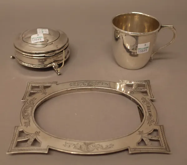 Silver and silver mounted wares, comprising; a shaped rectangular photograph frame, with pierced and engraved decoration, Birmingham 1909, a christeni