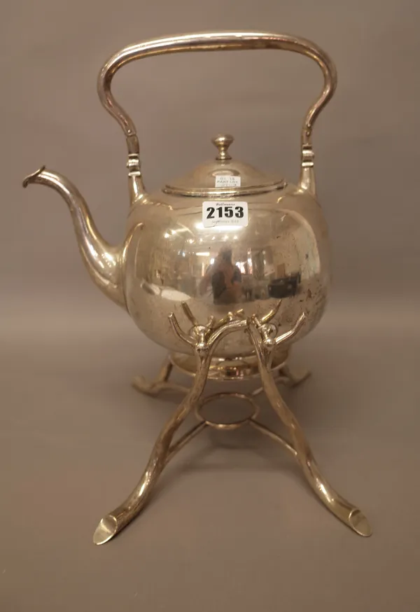 A Danish spirit kettle and stand, the kettle of spherical form, with a foldover handle, the lid detached at the hinge, with a rustic form stand, (the