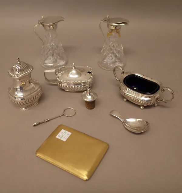 Silver and silver mounted wares, comprising; a tea caddy spoon, probably London 1814, a mustard pot, a pepperette and a salt, mixed dates, two faceted