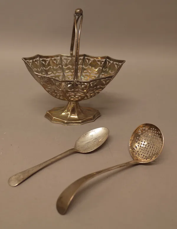 Silver, comprising; a late Victorian sugar basket, with pierced decoration and with a swingover handle, Chester 1900, an Old English pattern sugar sif