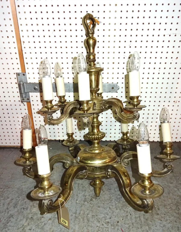 A Regency style twelve branch brass chandelier, 80cm wide x 82cm high.  HANG