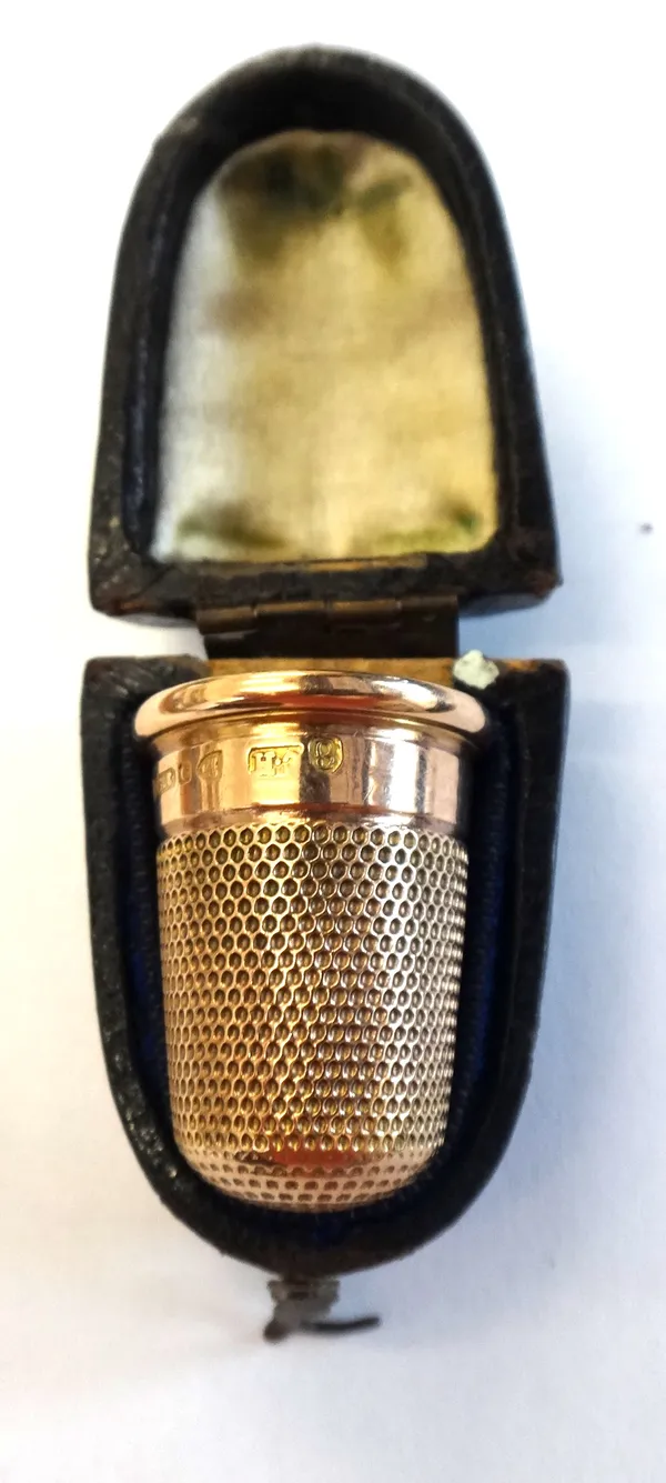 A 9ct gold thimble, the plain band engraved with initials, by Charles Horner, Chester 1905, weight 3.6 gms, with a thimble case.