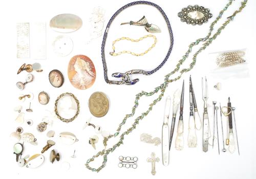 An unmounted oval shell cameo, carved as the portrait of a classical lady above a bird, with a case, an enamelled collar necklace, designed as a snake