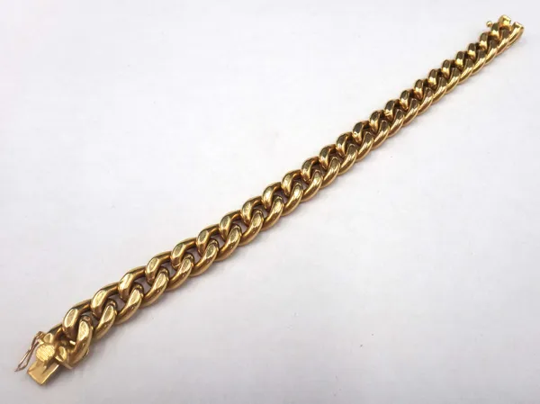A gold hollow faceted curb link bracelet, detailed 750, on a snap clasp, length 18cm, gross weight 17.5 gms.
