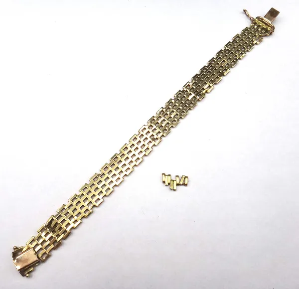 A gold curved bar link bracelet, on a snap clasp, with spare links, weight 19.2 gms.