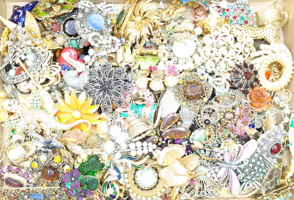 A collection of approximately one hundred and eighty costume brooches and pins, in a variety of designs, mostly 1960's to 1980's, (approx 180).