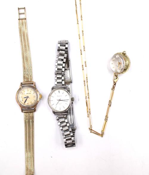 A Black, Starr & Gorham, gilt metal fronted and steel backed lady's wristwatch, on an associated 9ct gold bracelet, with a foldover clasp, gross weigh