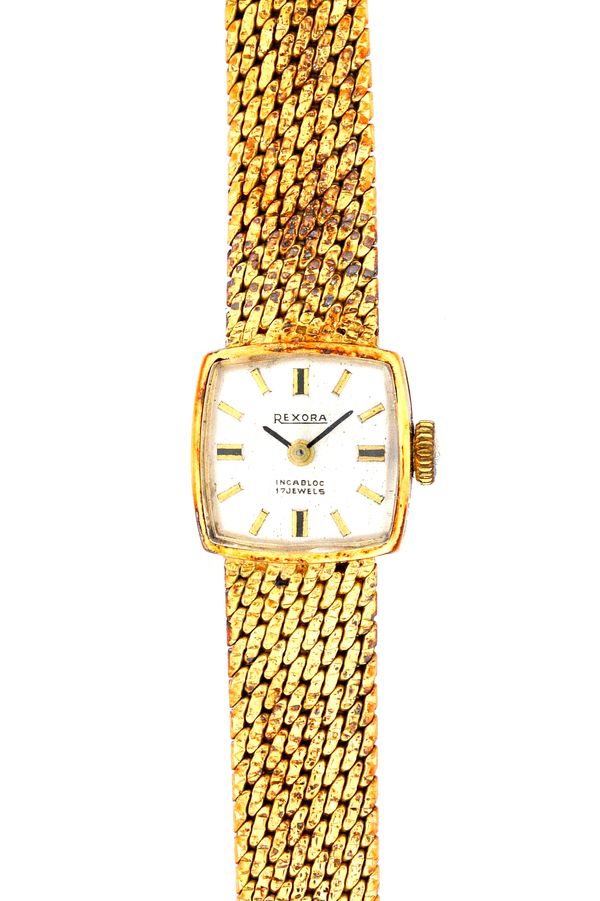A Rexora gold lady's bracelet wristwatch, the signed curved square silvered dial with baton shaped numerals, on a textured woven link bracelet, with a