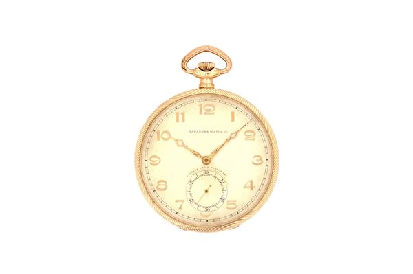 A Tavannes Watch Co gold cased, keyless wind, openfaced dress watch, with a signed jewelled lever movement, the inner and outer case detailed 56 14K 0