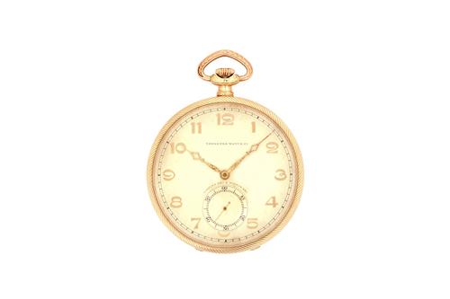 A Tavannes Watch Co gold cased, keyless wind, openfaced dress watch, with a signed jewelled lever movement, the inner and outer case detailed 56 14K 0