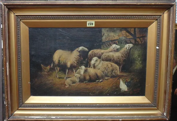 J. E. Winter (early 20th century), Sheep in a barn, oil on canvas, signed and dated 1905, 29cm x 49cm.  A3