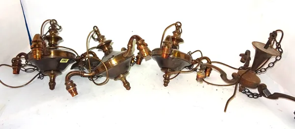 A group of nine 20th century bronzed metal three light ceiling lights.  S4T