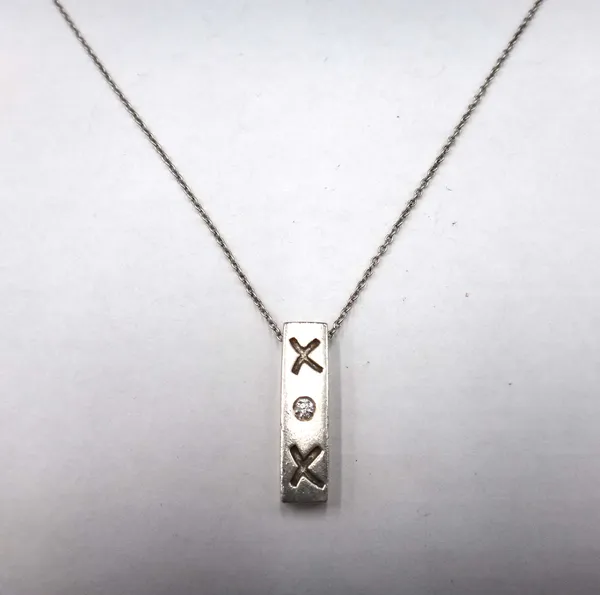 A Tiffany & Co Paloma Picasso silver and diamond set single stone pendant necklace, of rectangular form, mounted with a circular cut diamond, between