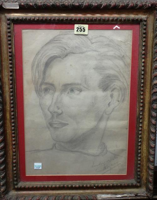 A group of three head studies, including; a study of a young man, a crayon and wash drawing of a sleeping child and a pencil study of a gentleman read