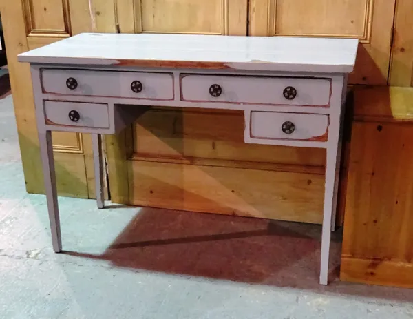 An early 20th century blue painted kneehole desk with four drawers on tapering square supports, 11cm wide x 77cm high.