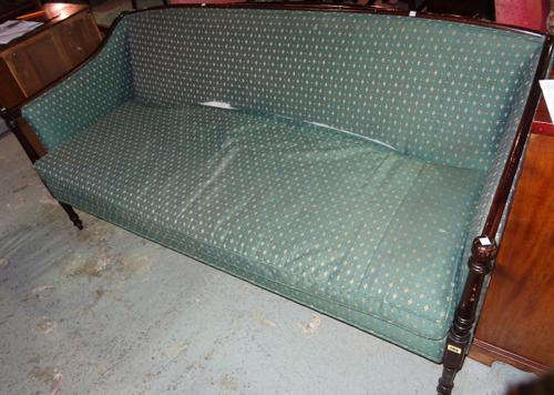 A Regency style mahogany show frame sofa with downswept arms and turned supports, 186cm wide x 85cm high.   BAY 2  E5