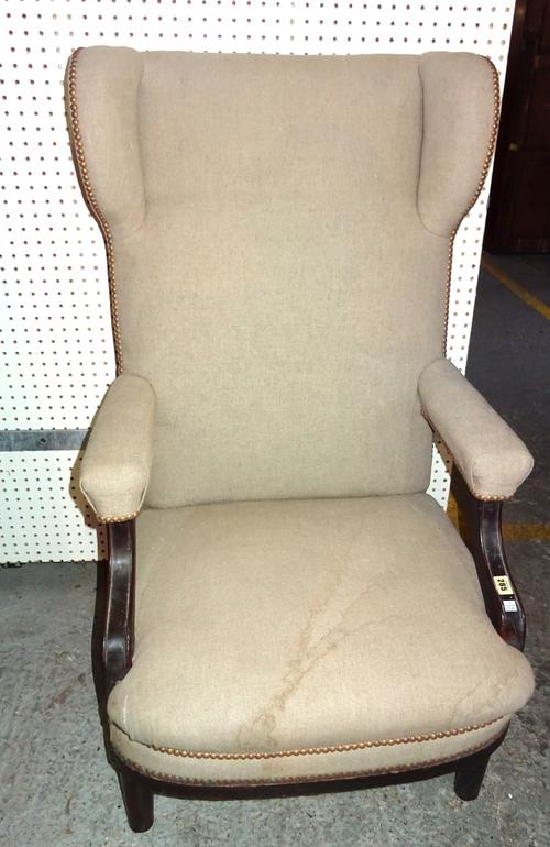 A 19th century French mahogany framed wingback open armchair, on turned supports, 63cm wide x 116cm high.   C3