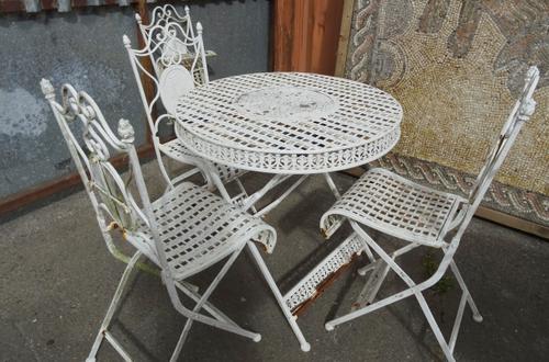 A 20th century white painted metal folding garden table 80cm wide with a matching set of four garden chairs (5).  OUT